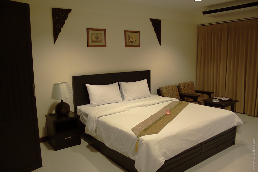 Кровать в True Siam Hotel